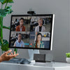 Webcam Logitech BRIO 4K HDR en uso sobre monitor durante videollamada, pensada para trabajo remoto y reuniones profesionales